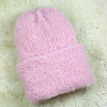 Load image into Gallery viewer, A furry hat with a twist brim