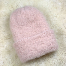 Load image into Gallery viewer, A furry hat with a twist brim