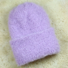 Load image into Gallery viewer, A furry hat with a twist brim