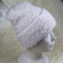 Load image into Gallery viewer, A furry hat with a twist brim
