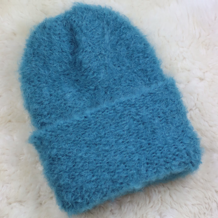 Keeratava äärega karvane müts - Puffy