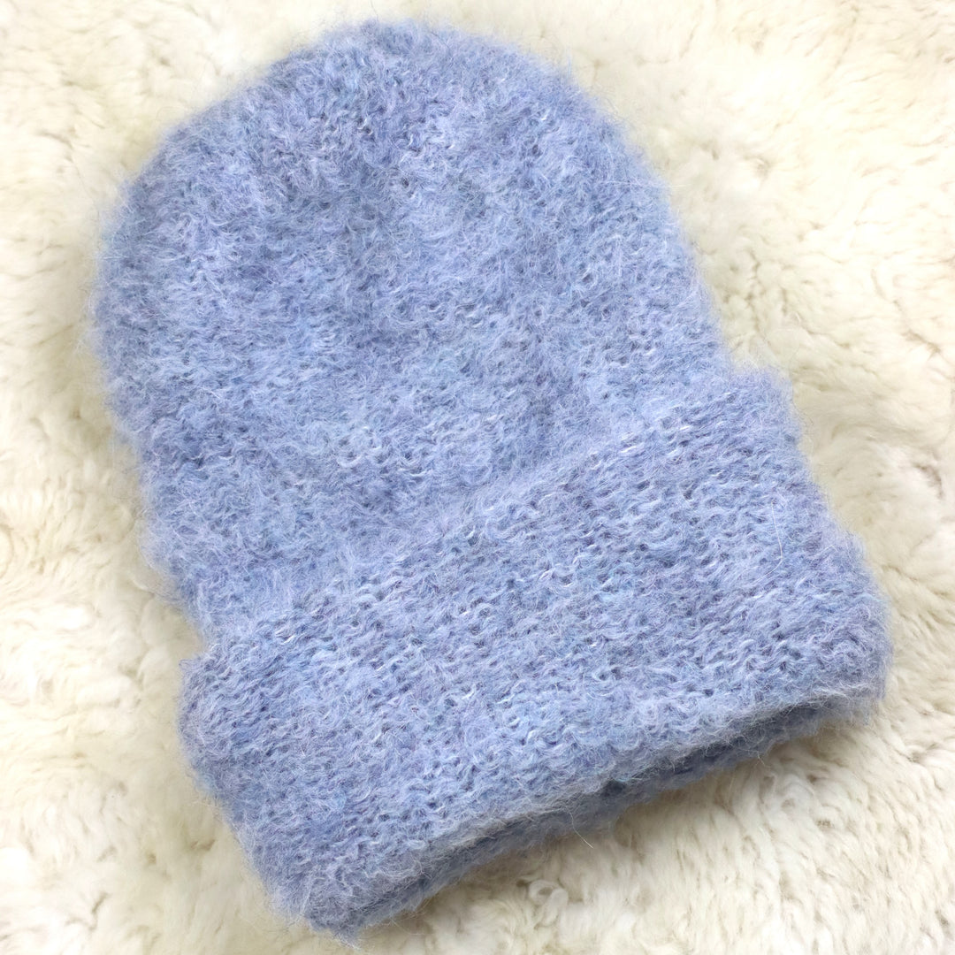 Keeratava äärega karvane müts - Puffy