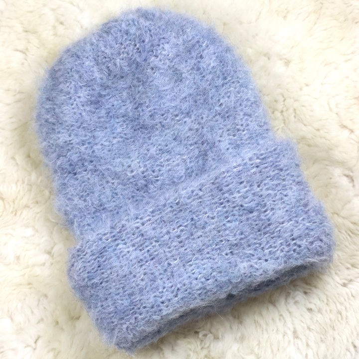 Keeratava äärega karvane müts - Puffy