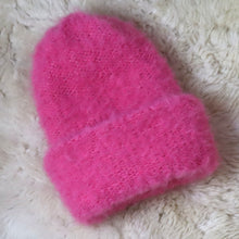Load image into Gallery viewer, A furry hat with a twist brim
