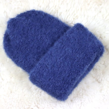 Load image into Gallery viewer, A furry hat with a twist brim
