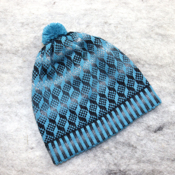 Patterned pom-pom hat
