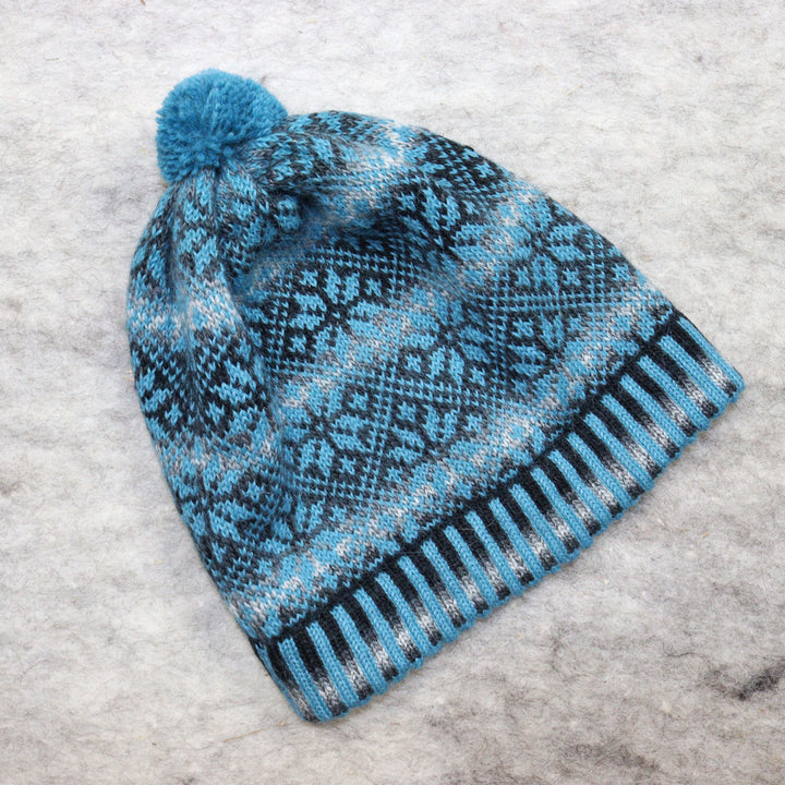 Patterned pom-pom hat