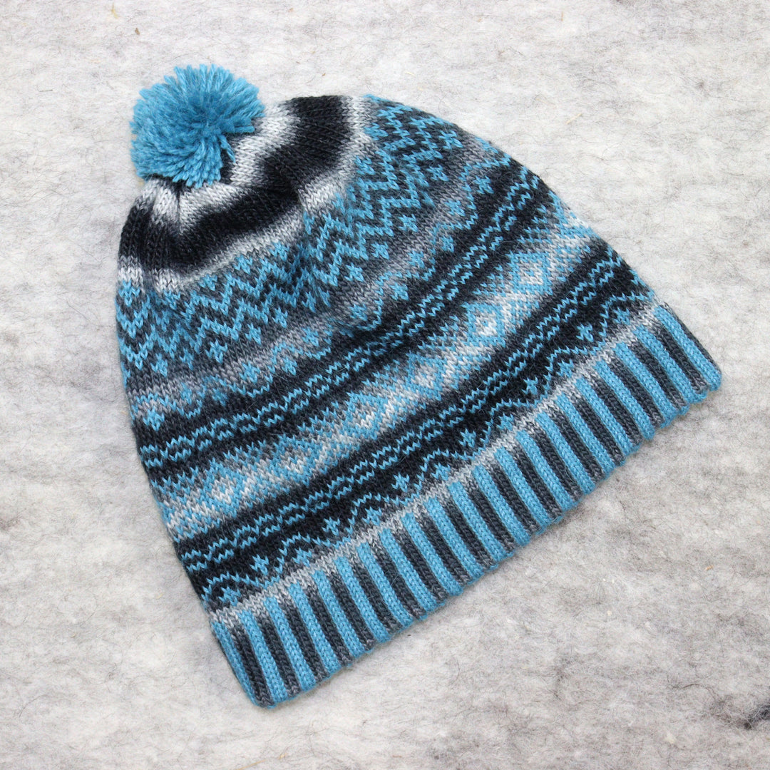 Patterned pom-pom hat