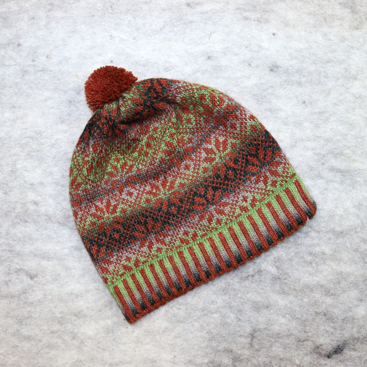 Patterned pom-pom hat