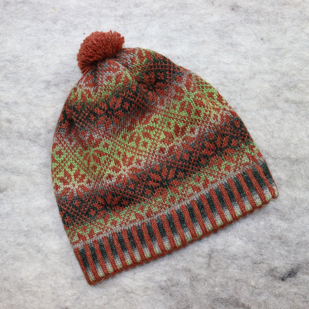 Patterned pom-pom hat