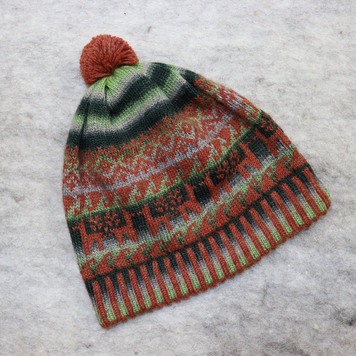 Patterned pom-pom hat