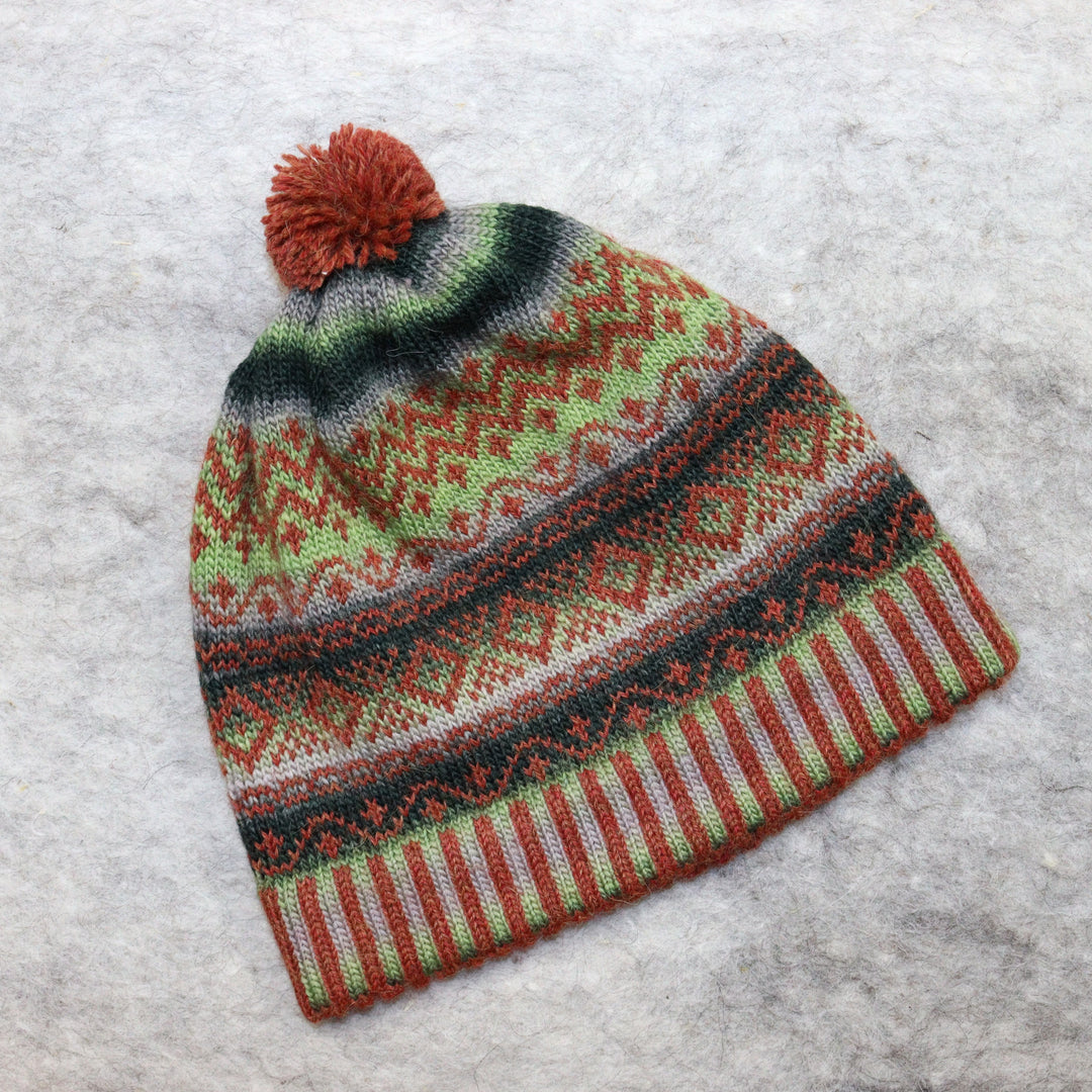 Patterned pom-pom hat