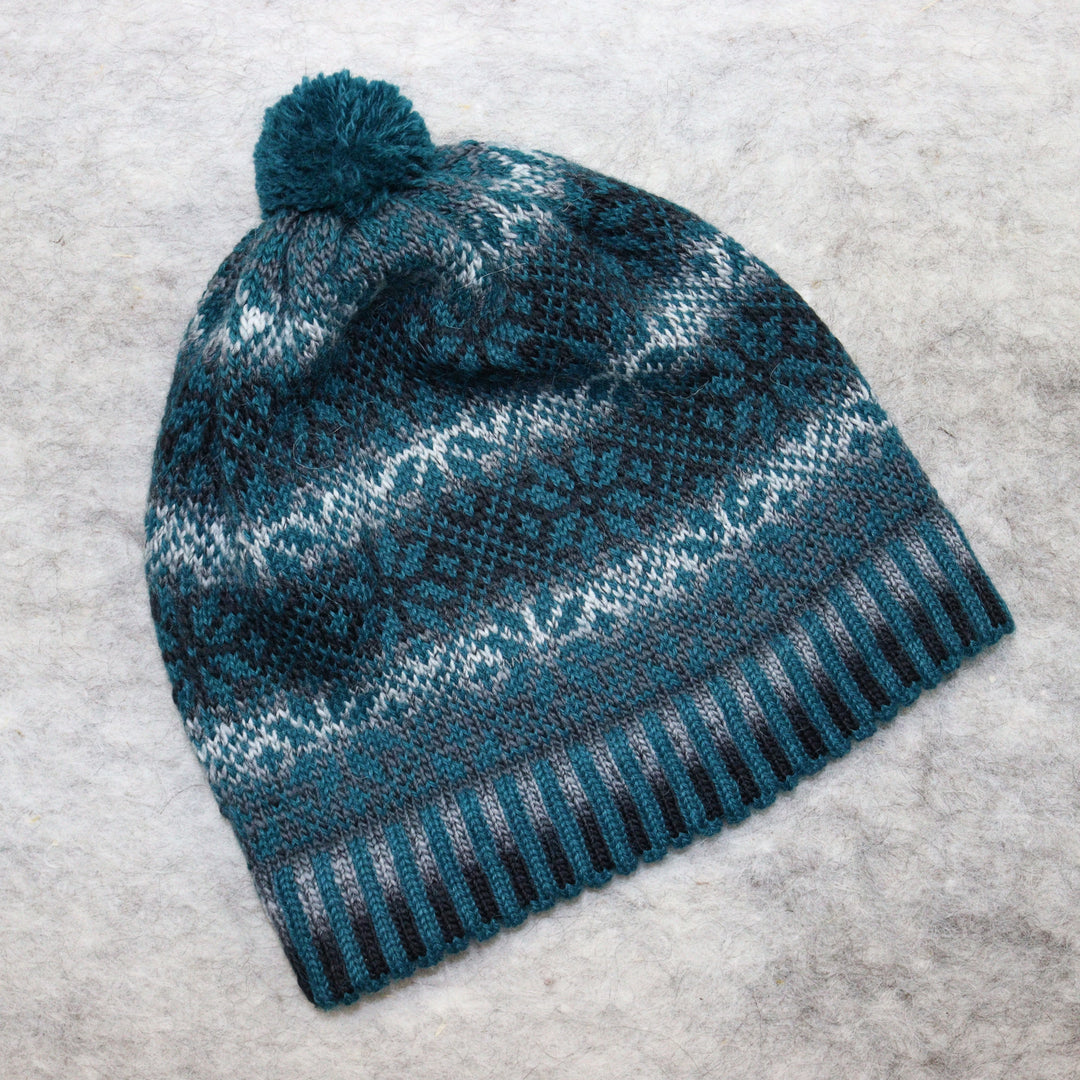 Patterned pom-pom hat