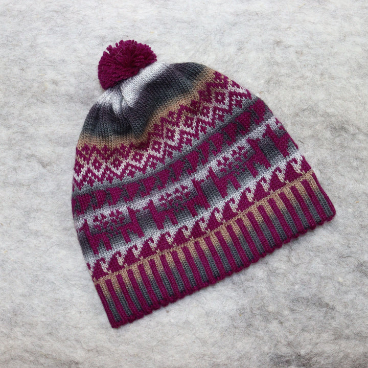 Patterned pom-pom hat