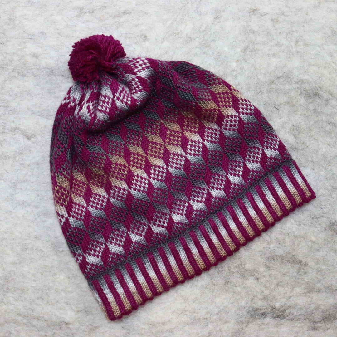 Patterned pom-pom hat
