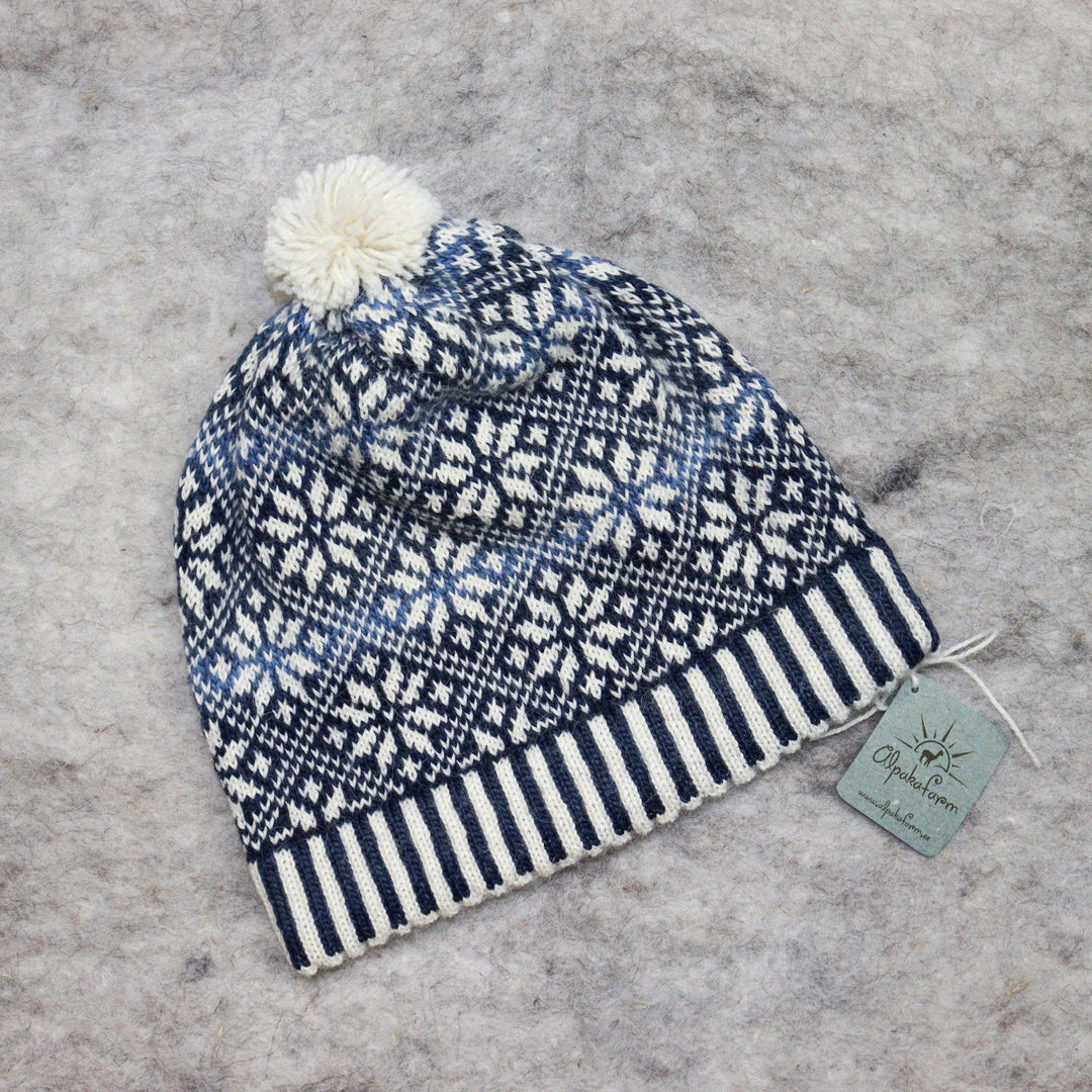 Patterned pom-pom hat
