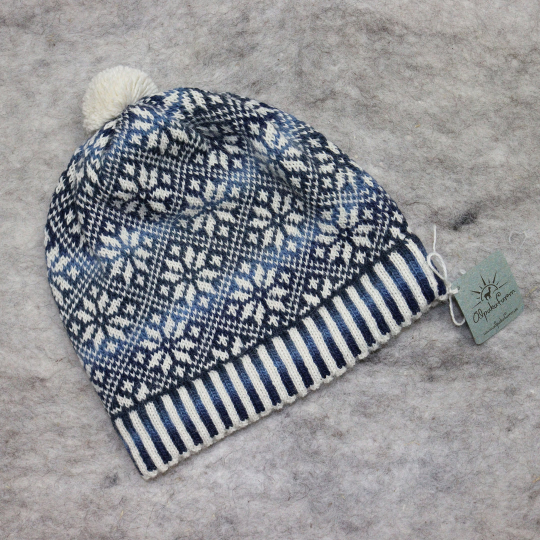 Patterned pom-pom hat