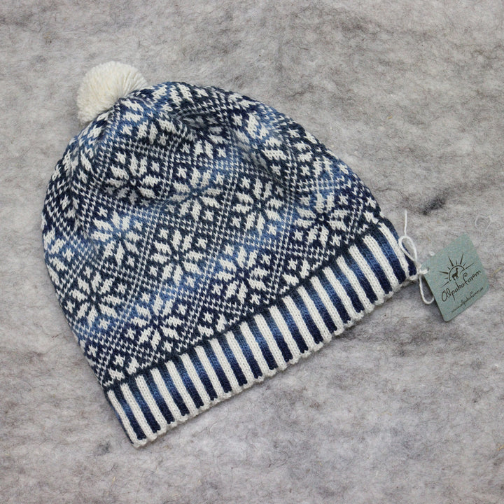 Patterned pom-pom hat