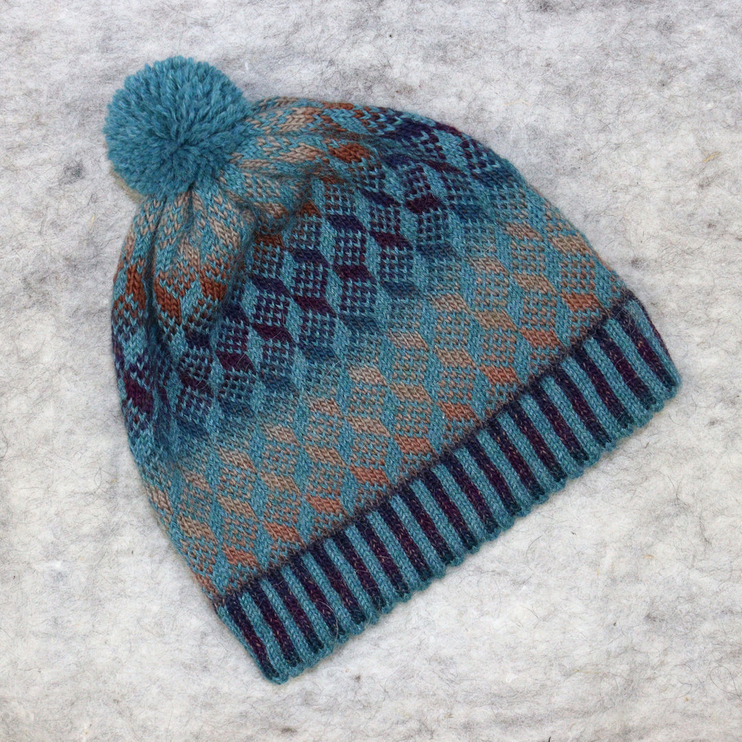 Patterned pom-pom hat