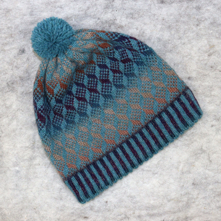 Patterned pom-pom hat