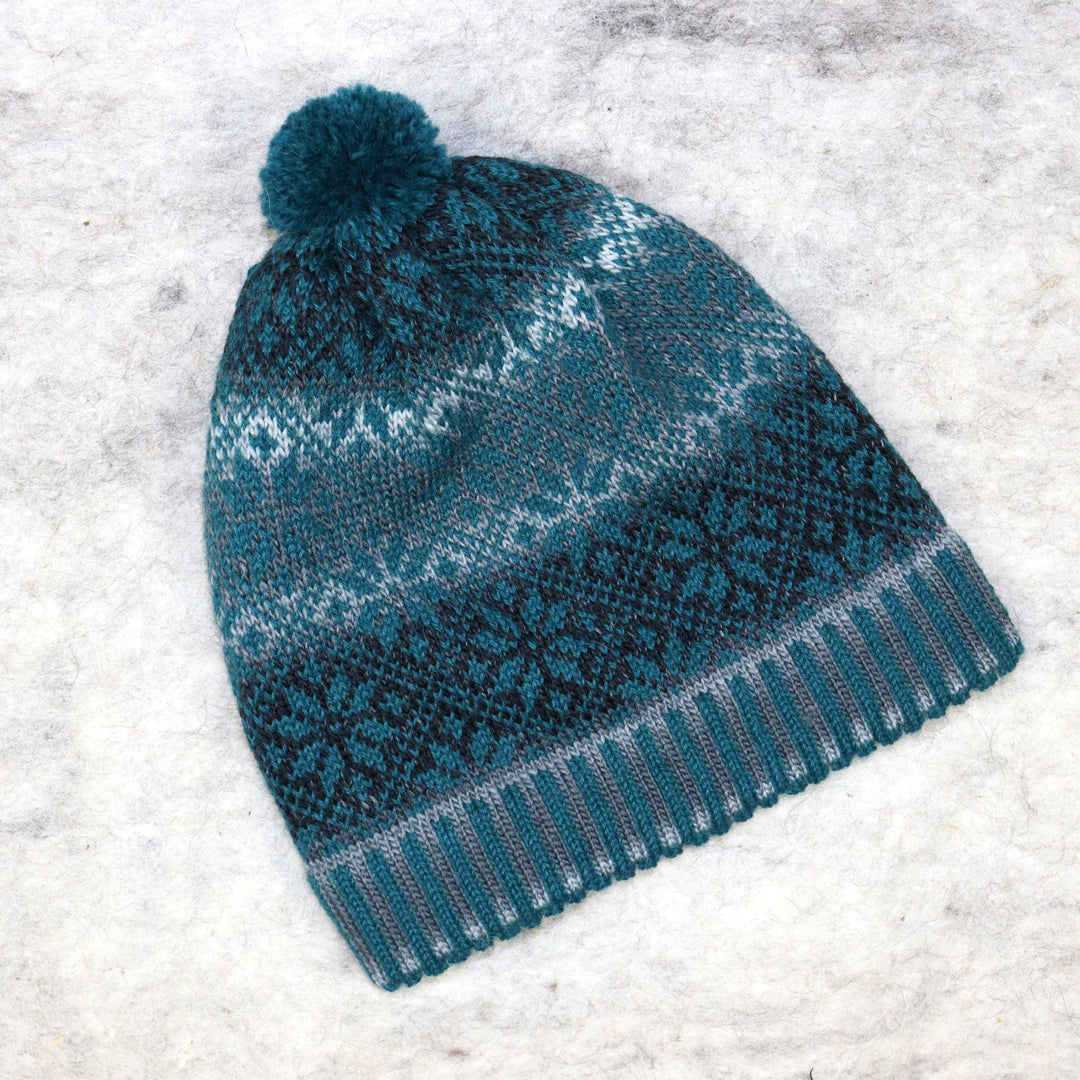 Patterned pom-pom hat