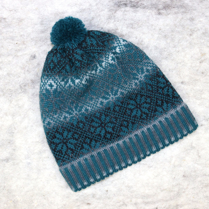 Patterned pom-pom hat