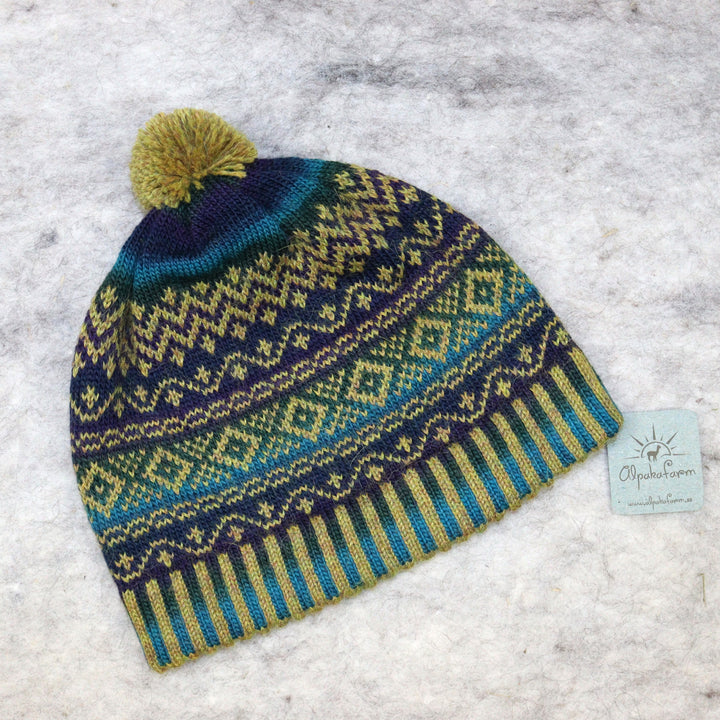 Patterned pom-pom hat