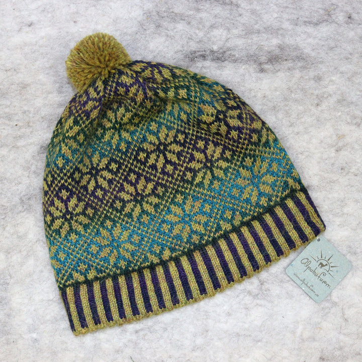 Patterned pom-pom hat