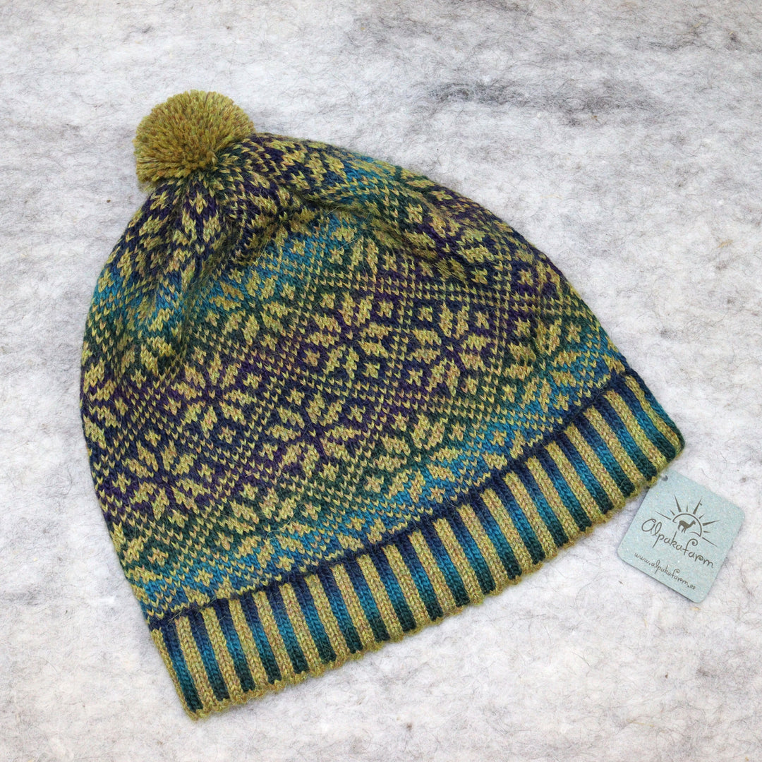 Patterned pom-pom hat