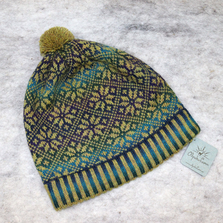 Patterned pom-pom hat