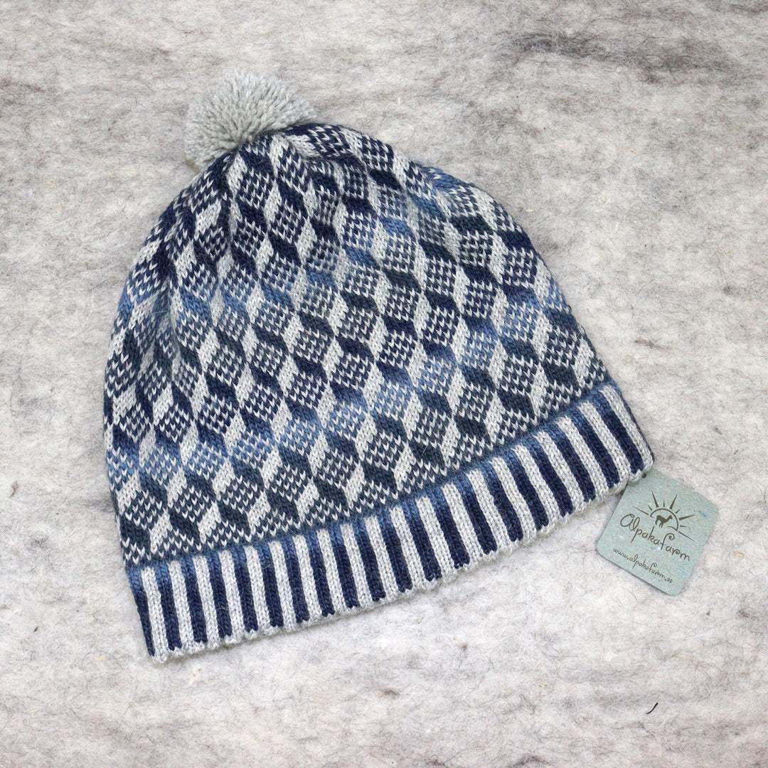 Patterned pom-pom hat
