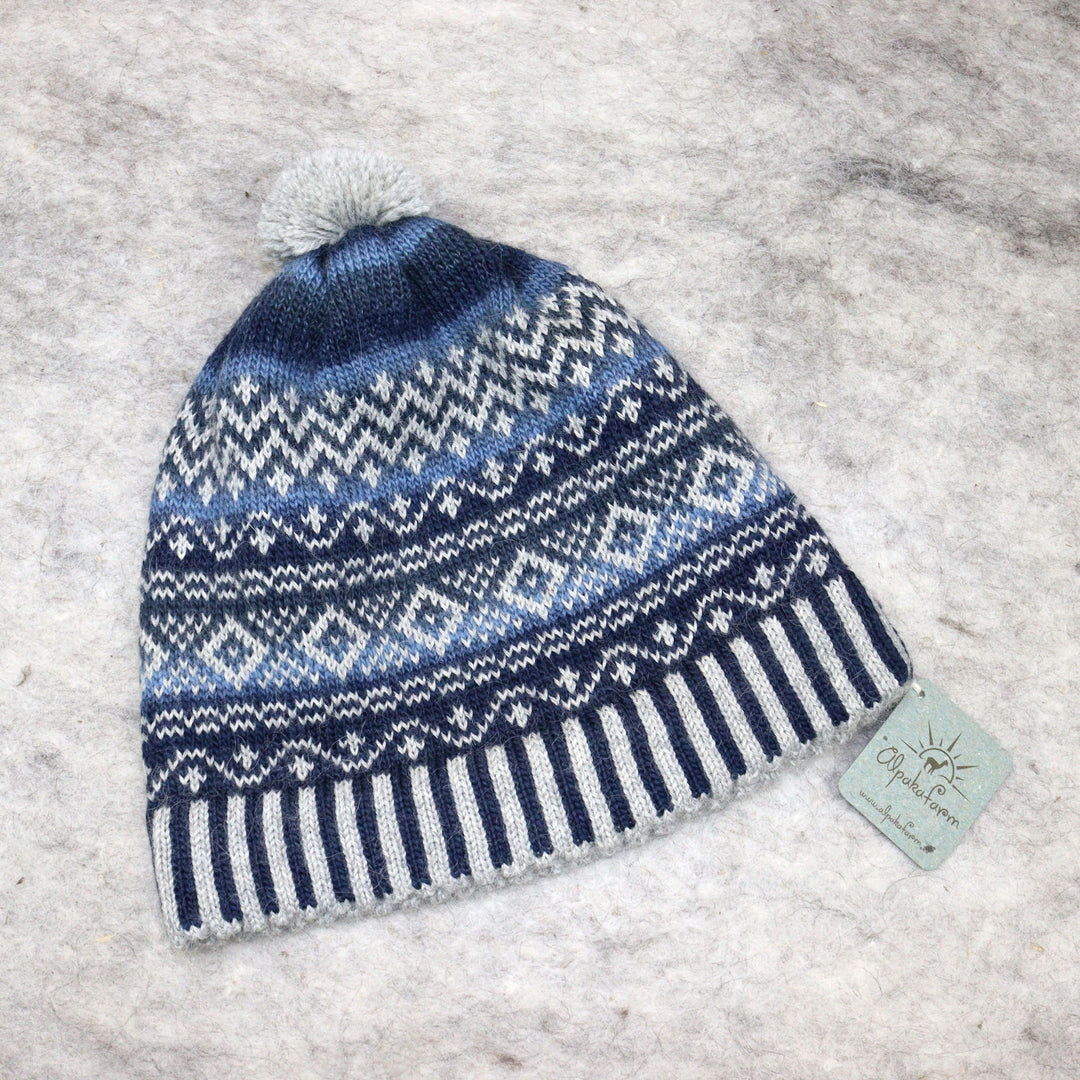 Patterned pom-pom hat