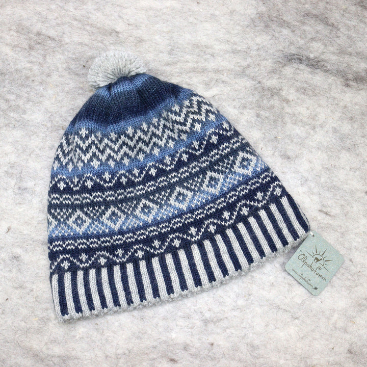 Patterned pom-pom hat