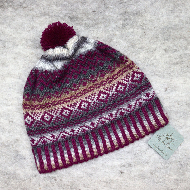 Patterned pom-pom hat