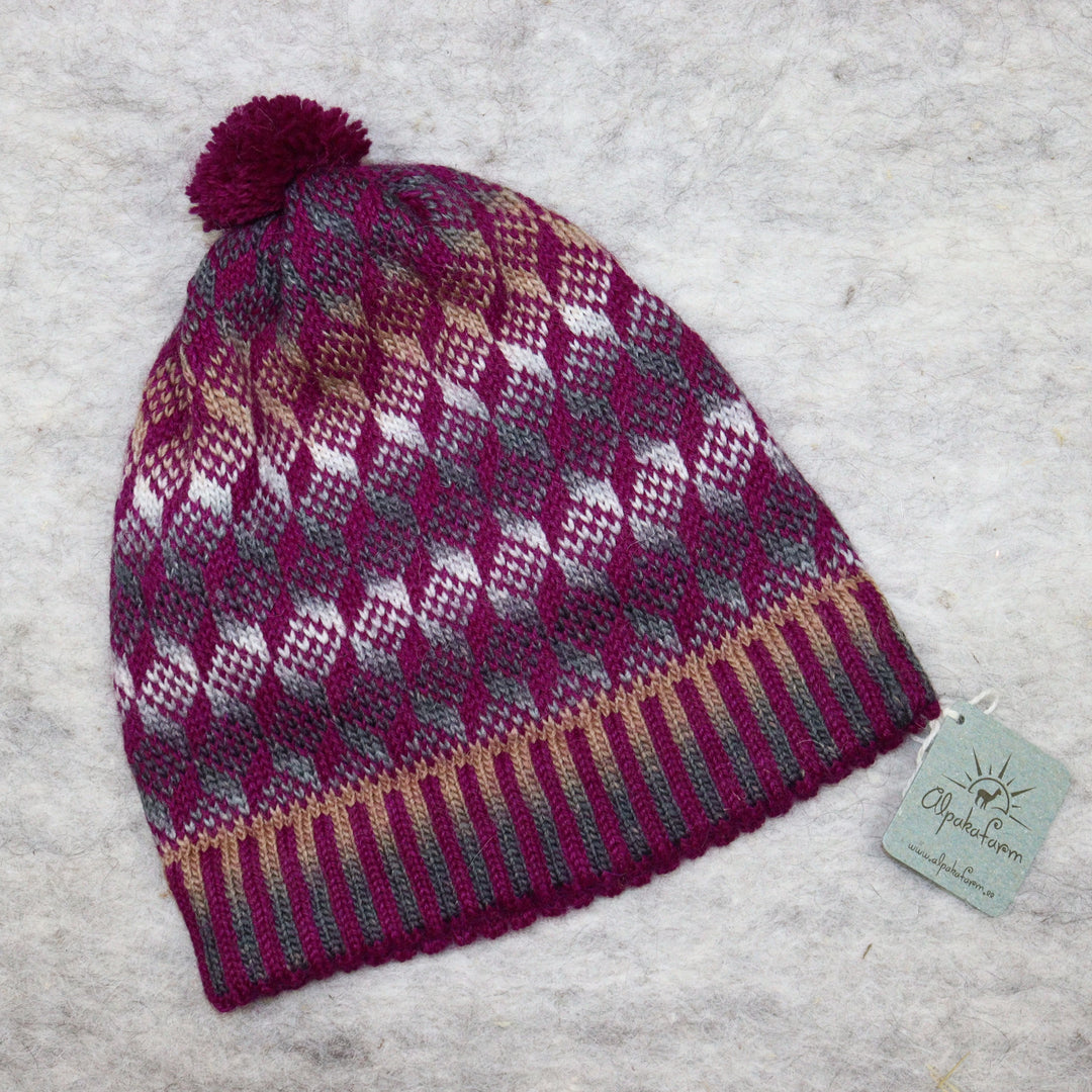 Patterned pom-pom hat