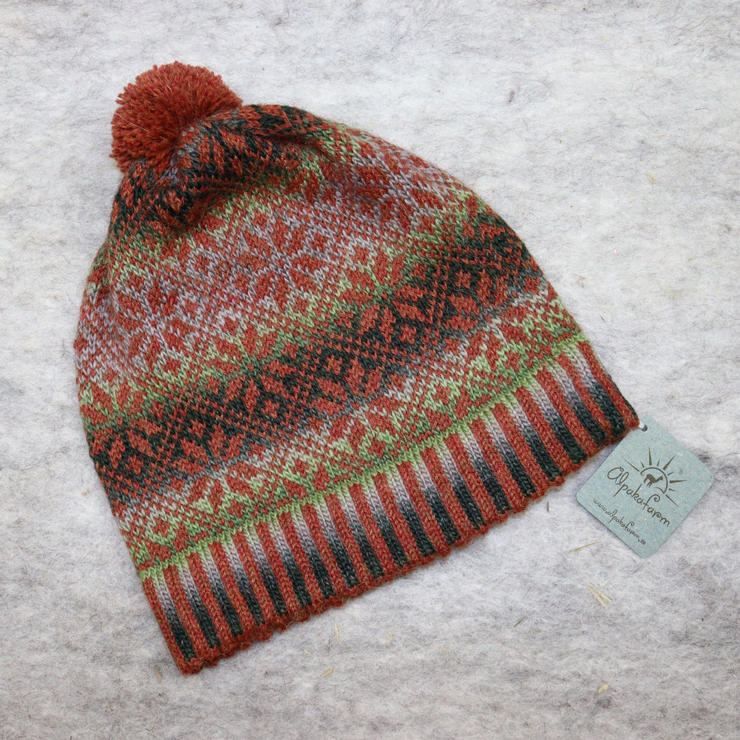 Patterned pom-pom hat