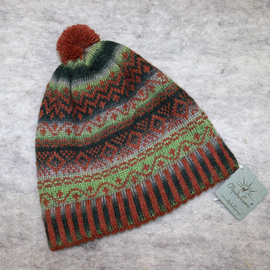 Patterned pom-pom hat