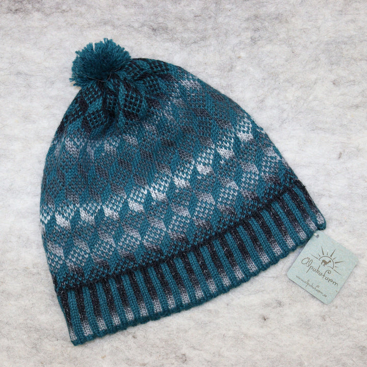 Patterned pom-pom hat