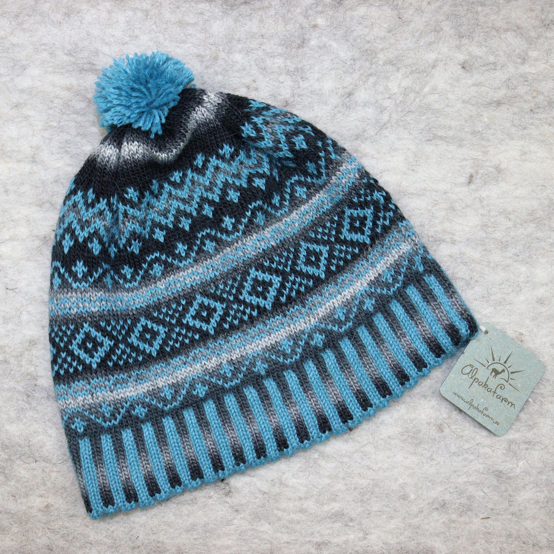 Patterned pom-pom hat