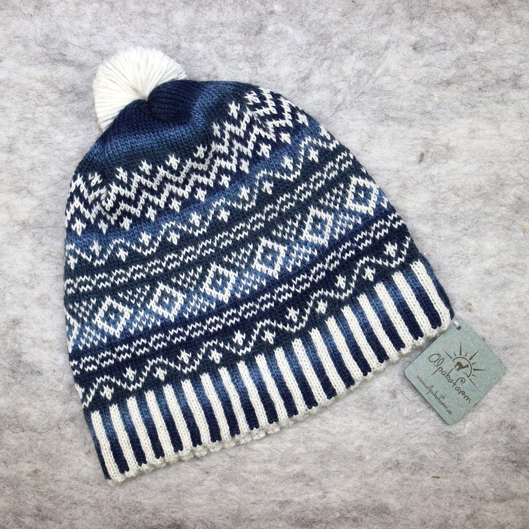 Patterned pom-pom hat