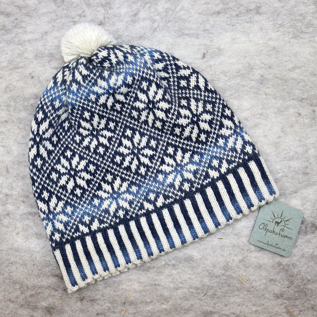 Patterned pom-pom hat