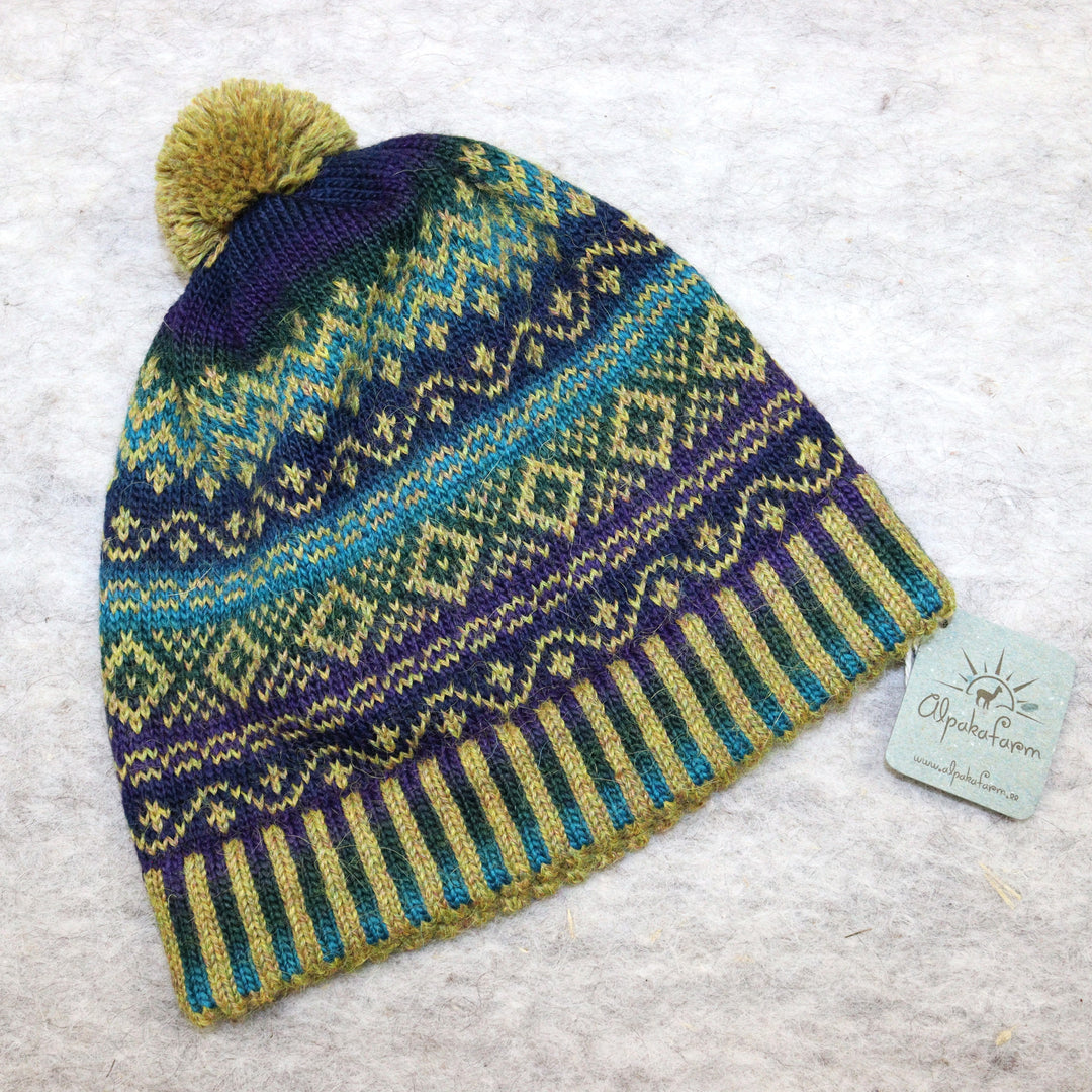 Patterned pom-pom hat